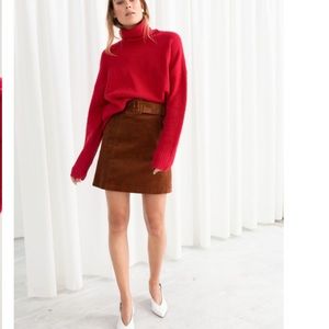 And Other Stories red turtleneck